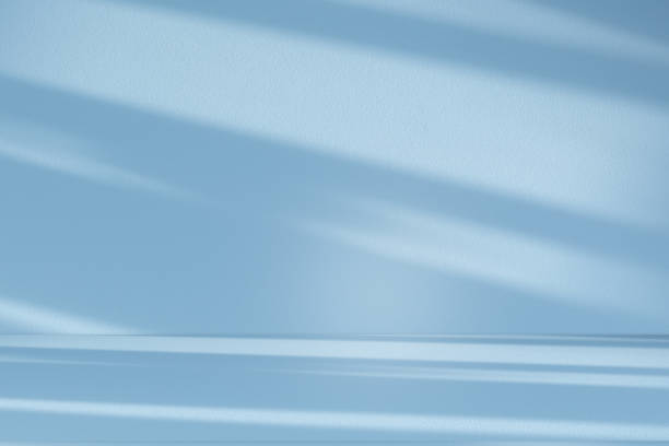 istock Studio style background wall decoration presentation uses white and blue tones. with shadows cast from a nearby window, concept creating a decorative 2169969267