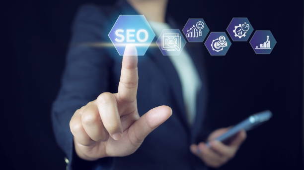 istock Businessman touching SEO icon on virtual screen for analyze SEO search engine optimization. Promote ranking traffic on website .Touch Screen Concept with man touching screen with finger. 2169971227