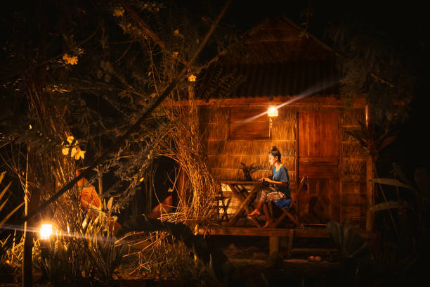 istock Young caucasian hipster couple sit use computer freelance do freelancing work, write travel blog or browse internet search, work online while traveling in southeast asia tropical islands 2169971853