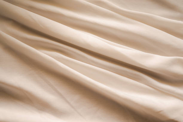 istock Cloth beige fabric texture woven background crumpled soft Pattern textile fabric silk natural fiber linen decor tablecloth material product eco drapery,wedding fashion presentation product cosmetic. 2169971990