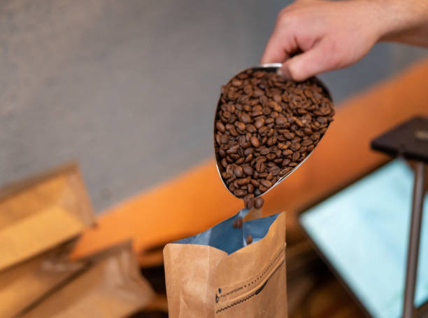 istock The man is packaging roasted coffees ready for sale. 2169973570