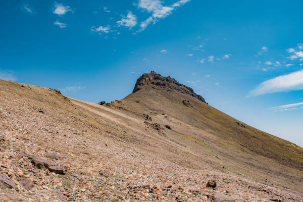 istock hiking to beautiful mountains in summer time 2169973908
