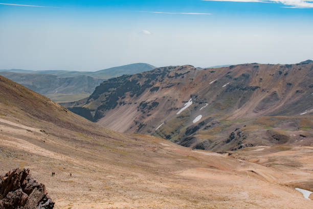 hiking to beautiful mountains in summer time