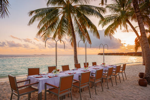 istock Table for dinner on the tropical beach at Maldives Islands 2169974870