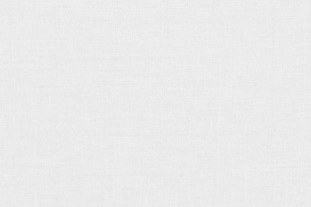 istock White linen fabric texture background, seamless pattern of natural textile. 2169976579