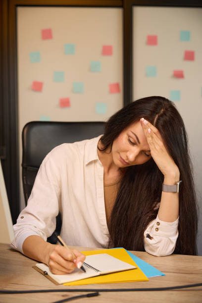 istock Woman at her workplace in a modern coworking space 2169976605