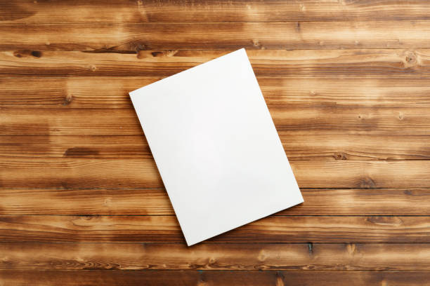istock A Blank Notepad Resting on a Wooden Table in Natural Light During Daytime 2169976714