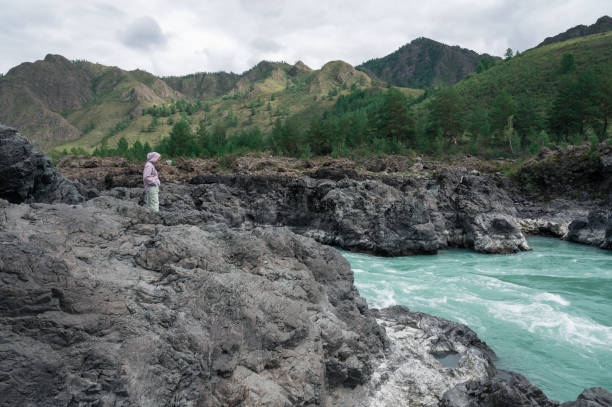 istock Woman at the river Katun 2169978935