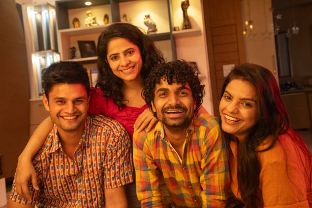 istock Happy friends enjoying at home during weekend 2169981881