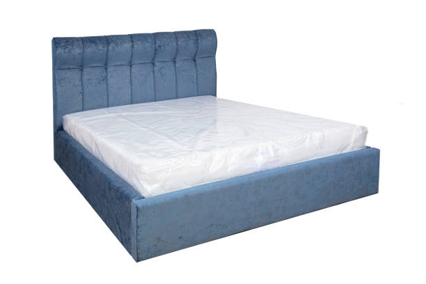 istock Double bed with soft headboard. Cushioned furniture. 2169982213