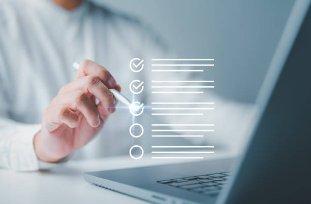istock Quality control, Checklist track steps, Online survey. Filling out forms for quality check improvement. Standardization, certification. Compliance with regulations for products, services, standards. 2169985166