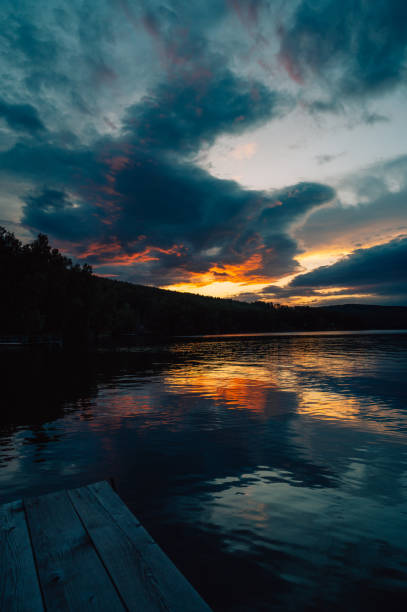 A calm and silent evening at sunset at the summer lake