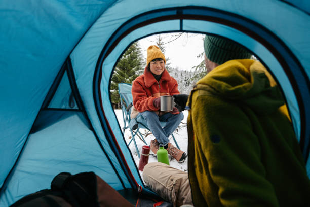 istock Couple on a winter camping 2169986279