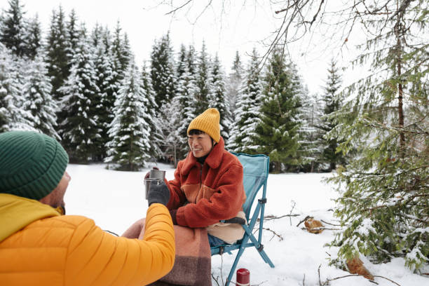 istock Couple on a winter camping 2169986283