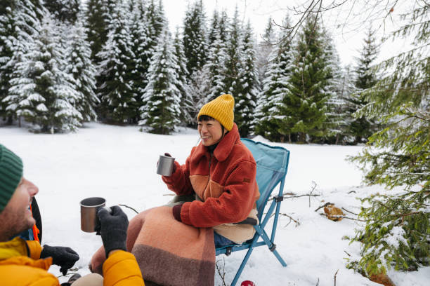 istock Couple on a winter camping 2169986296