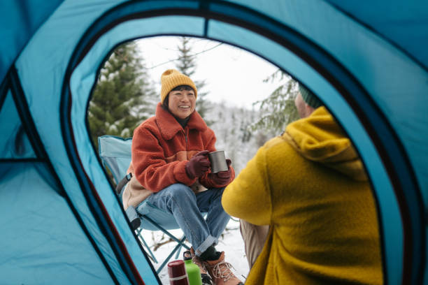 istock Couple on a winter camping 2169986297