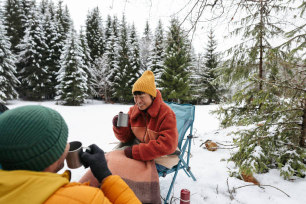 istock Couple on a winter camping 2169986305