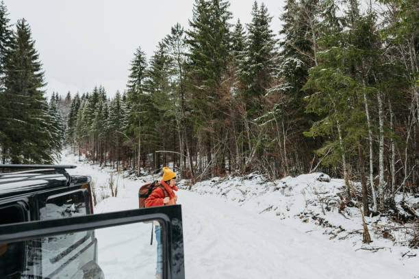 istock An Asian woman on a winter road trip 2169986355