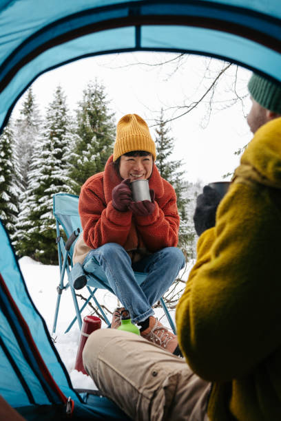 istock Couple on a winter camping 2169986582