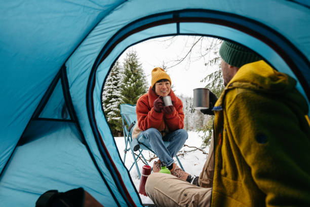 istock Couple on a winter camping 2169986583