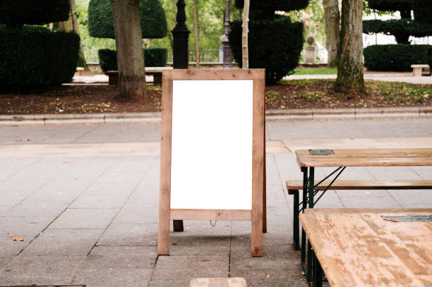 Blank wooden A sign in a city street