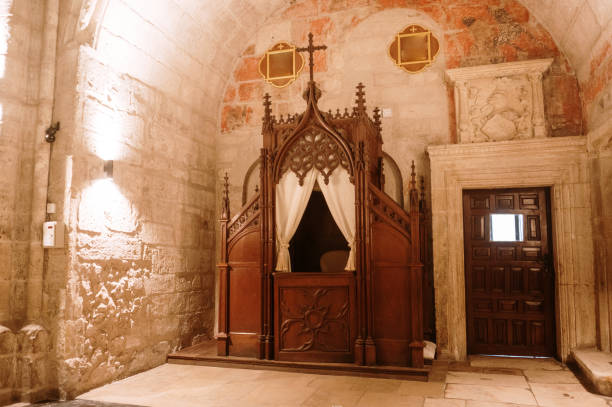 istock Confession booth in a church 2169988689