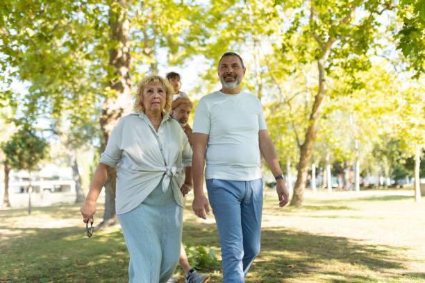 istock Happy multi-generation family walking together through the park 2169991209