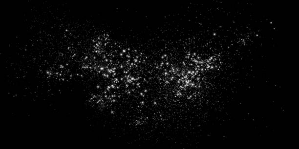 istock Luminous bokeh, softly shimmering with white light. Light abstract glowing lights. Glowing bokeh effect isolated on dark transparent background. Christmas background made of glowing dust. 2169992706