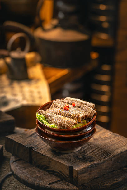 Tripe also called cow stomach, a common ingredient in Chinese hot pot, with text on blurred background in Chinese style indoors