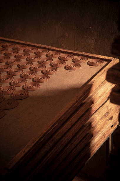 istock Incense coils are traditionally used as sacrificial objects in temples in Asian countries and can also be used at home. The picture shows the production process 2169994917