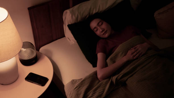 istock Asian woman sleeping at night 2169994920