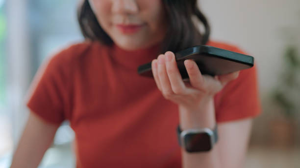 Asian woman using ai chat for helping to work