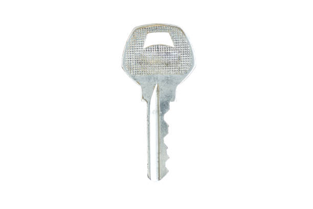 Silver key for mortice sash and dead locks isolated on white with clipping path