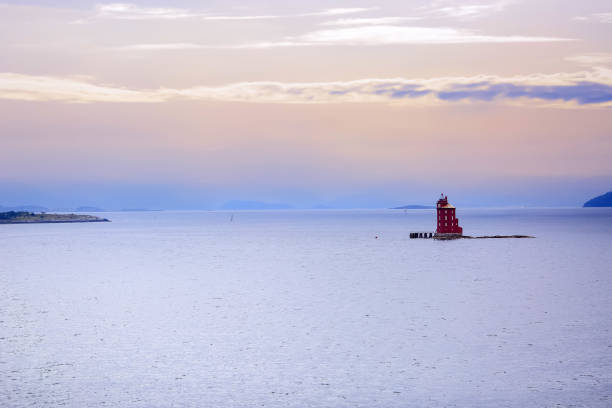 Old timber lighthouse Kjeungskjaer located in Oerland, Norway
