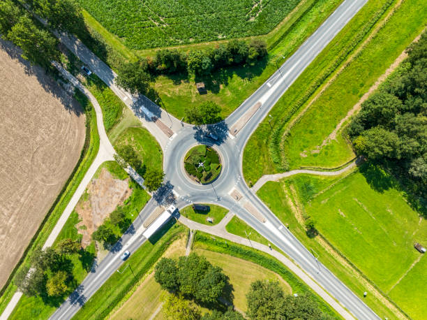 istock Traffic driving over a roundabout seen from above 2170010255