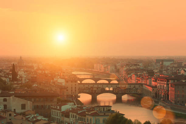 Golden sunrise over Palazzo Vecchio and Cathedral of Santa Maria del Fiore (Duomo), Florence, Italy.