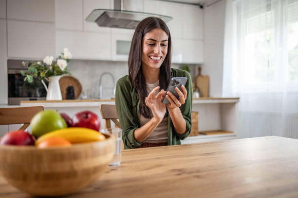 istock Modern communication, Woman on the phone at the table 2170013203