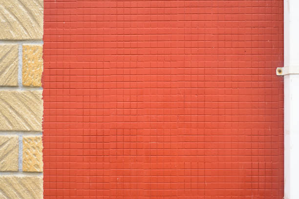 Red paint grid tile detail outdoors
