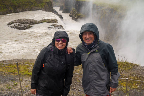 istock Couple posing at Gullfoss waterfall in Iceland 2170017252