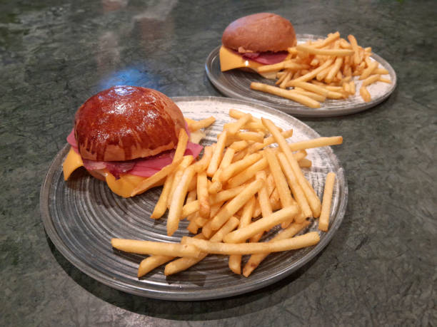 istock Cheese burger with bacon and patatoes 2170020487