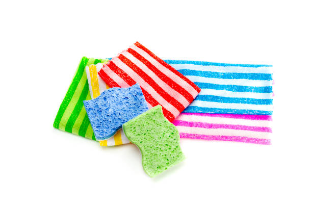 New, bright, contemporary cleaning rags and washcloths on a white background close-up