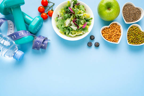 istock Healthy food and exercising border. Copy space. 2170022170