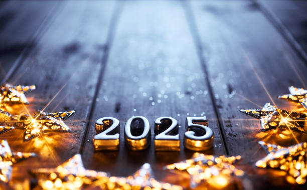 istock Shining 2025 Surrounded by Illuminated Stars on Rustic Wooden Table for New Year Celebration 2170022964