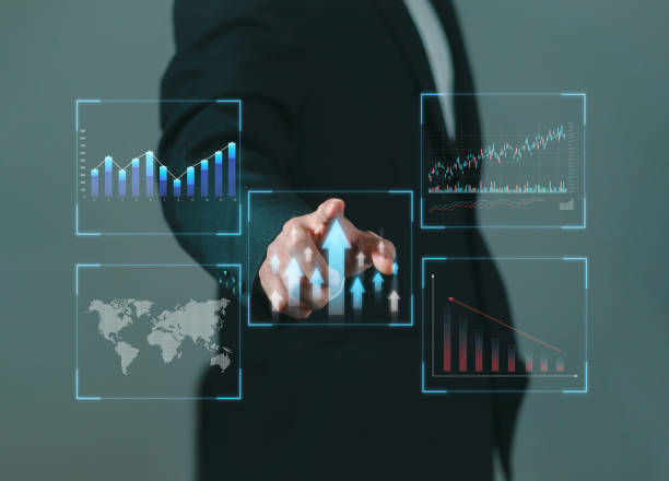 istock Businessman is selecting up arrow with virtual technical graph and chart to analyze stock market, technology investment and value investing concept. 2170029888