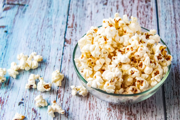 istock a bowl of popcorn on a wooden table 2170032906