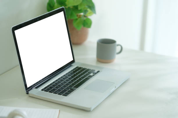 istock Workspace desk and laptop. copy space and blank screen. 2170033123