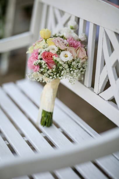 istock Wedding bouquet on the white wooden bench 2170035071