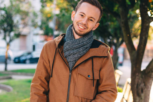 istock guy smile and look at camera. urban style. close up. 2170039598