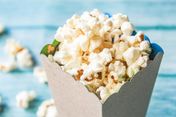 istock close-up of popcorn in a box on a table 2170043060