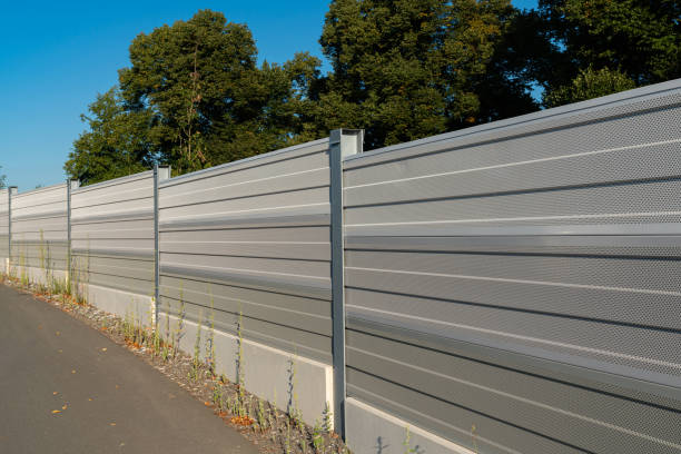 istock Modern sound barrier along roadway. 2170051166